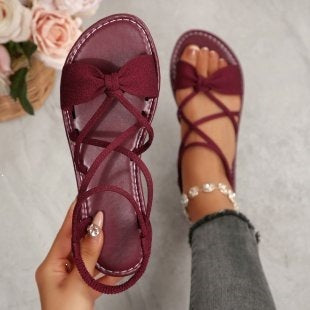 Damen Zarte Römersandalen mit Schleifen-Detail und verstellbaren Schnürriemen Shop Nory