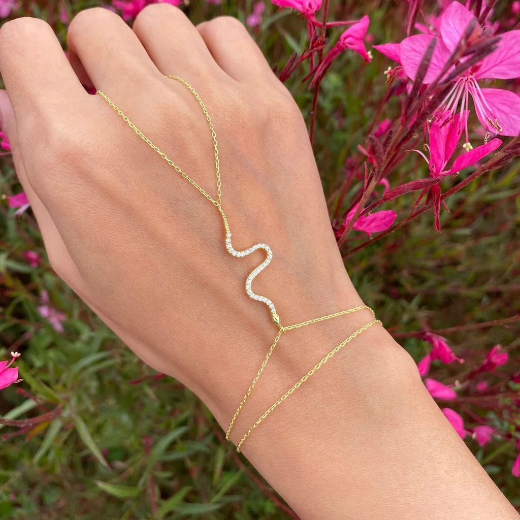 Damen Handkette mit elegantem Wellen-Design und funkelnden Zirkonia-Elementen Shop Nory