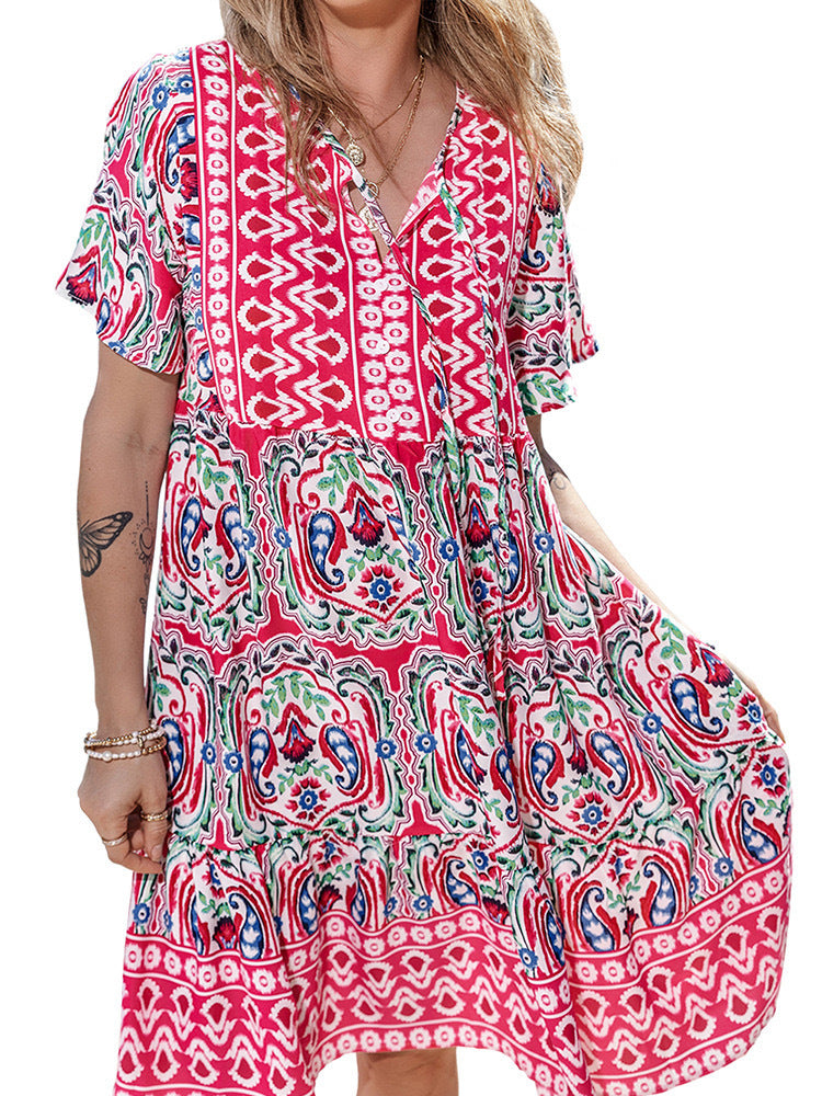 Damen Lockeres Stufen‑Midikleid mit V‑Ausschnitt, Quastenbindeband und Boho‑Print Shop Nory