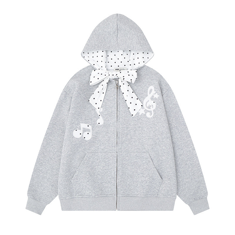 Damen Kapuzensweatjacke mit gepünktetem Kapuzenfutter, dekorativer Schleife und Notenmotiv Shop Nory