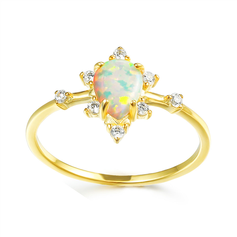 Damen Ring mit funkelndem Tropfen-Opal und elegantem Zirkonia-Design Shop Nory