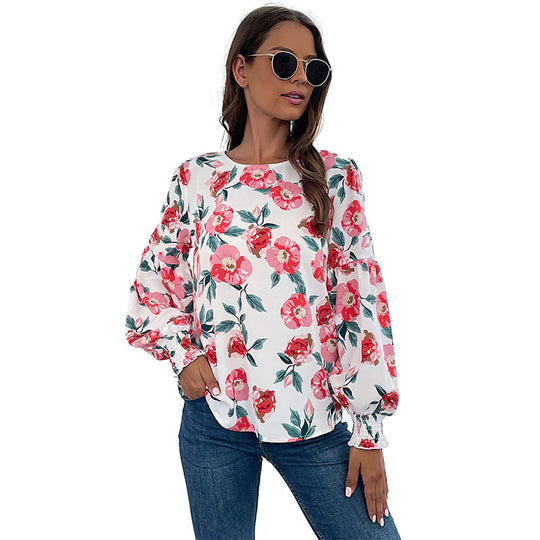 Damen Leichte Bluse mit großflächigem Blumenprint, Volumenärmeln und Smokbündchen Shop Nory