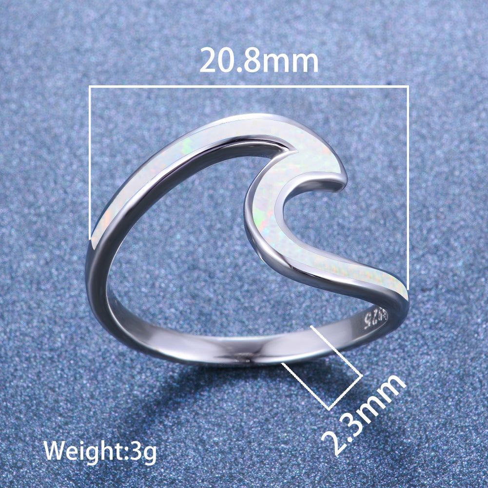 Damen Ring mit modernem, geschwungenem Design und opalisierten Akzenten Shop Nory