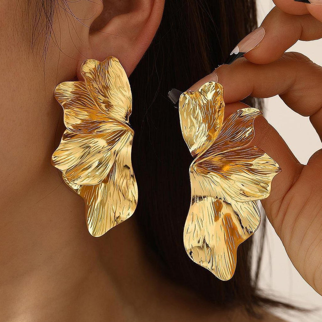 Damenohrringe mit floralen Motiven und glänzender Oberfläche Shop Nory