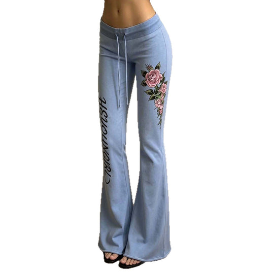 Damen nan ausgestellte Jersey-Sweathose mit Kordelzug, floralem Seitenprint und Statement-Schriftzug Shop Nory