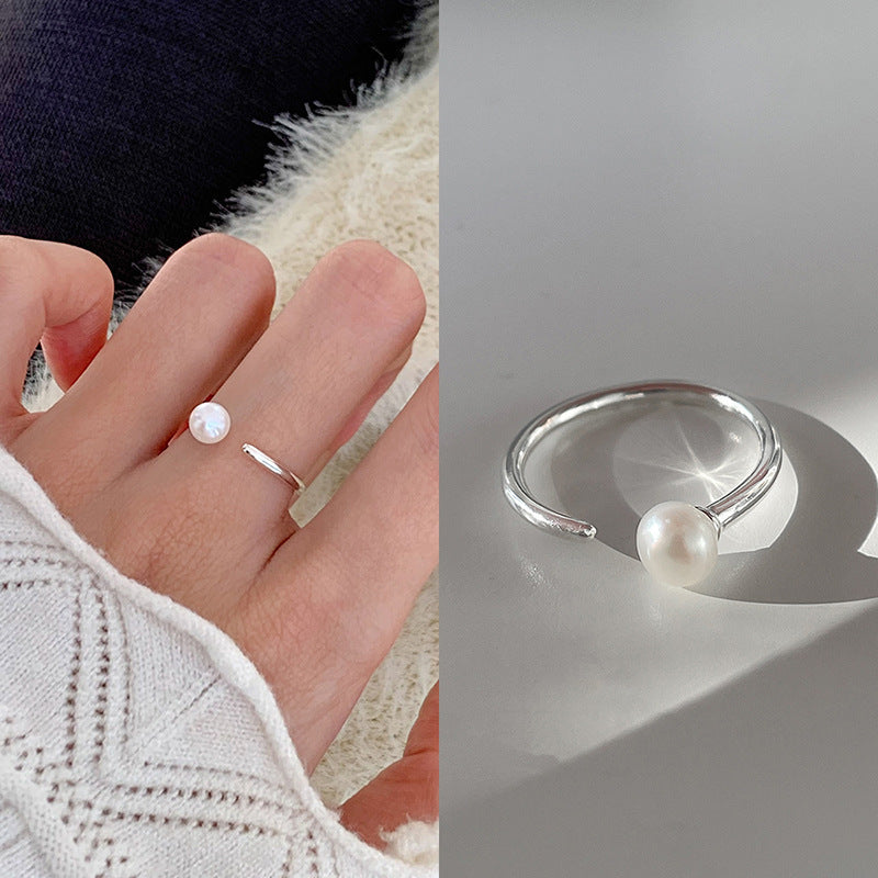 Damenring mit kunstvollem Wellen-Design und funkelnden Akzenten Shop Nory