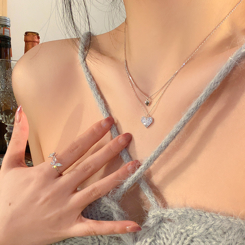Damen Halskette mit doppeltem Herzanhänger und funkelnden Zirkonia Shop Nory