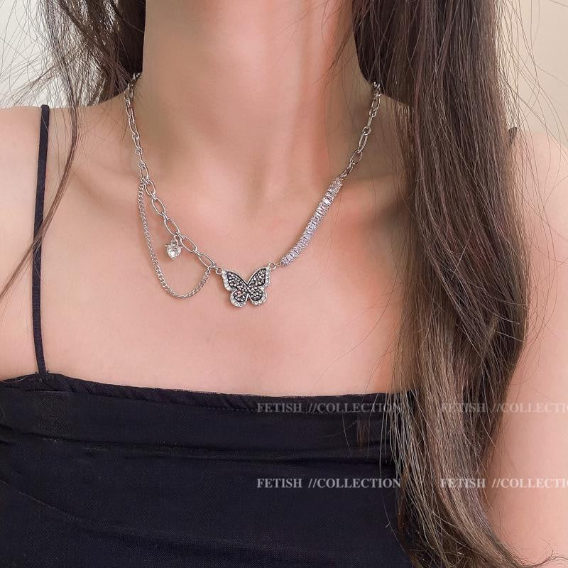 Damen Halskette mit verspieltem Schmetterlingsanhänger und eleganten Gliederketten Shop Nory