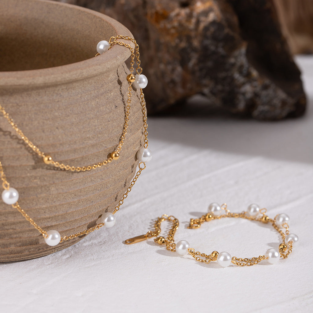 Damen Armband mit elegantem Perlen- und Goldakzent Design Shop Nory