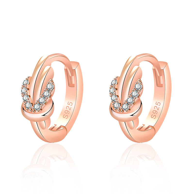 Damen Ohrringe mit elegantem Knoten-Design und funkelndem Zirkonia-Besatz Shop Nory
