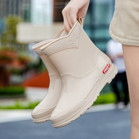 Damen Ankle‑Gummistiefel im Chelsea‑Stil mit glänzender Schutzschicht und griffiger Profilsohle Shop Nory