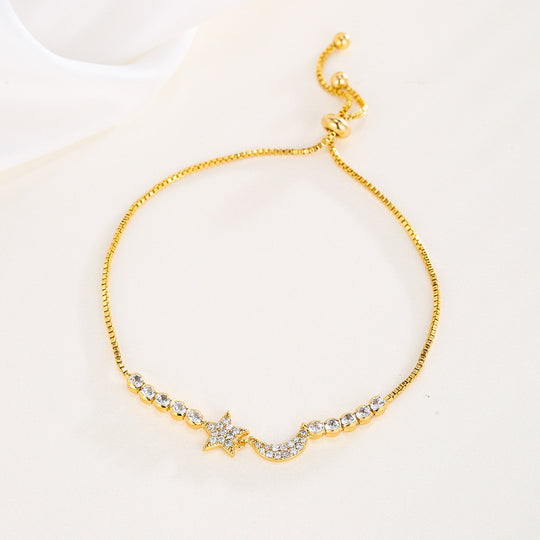 Verstellbares Gliederarmband mit Mond- und Sternanhänger und Zirkonia-Einlage