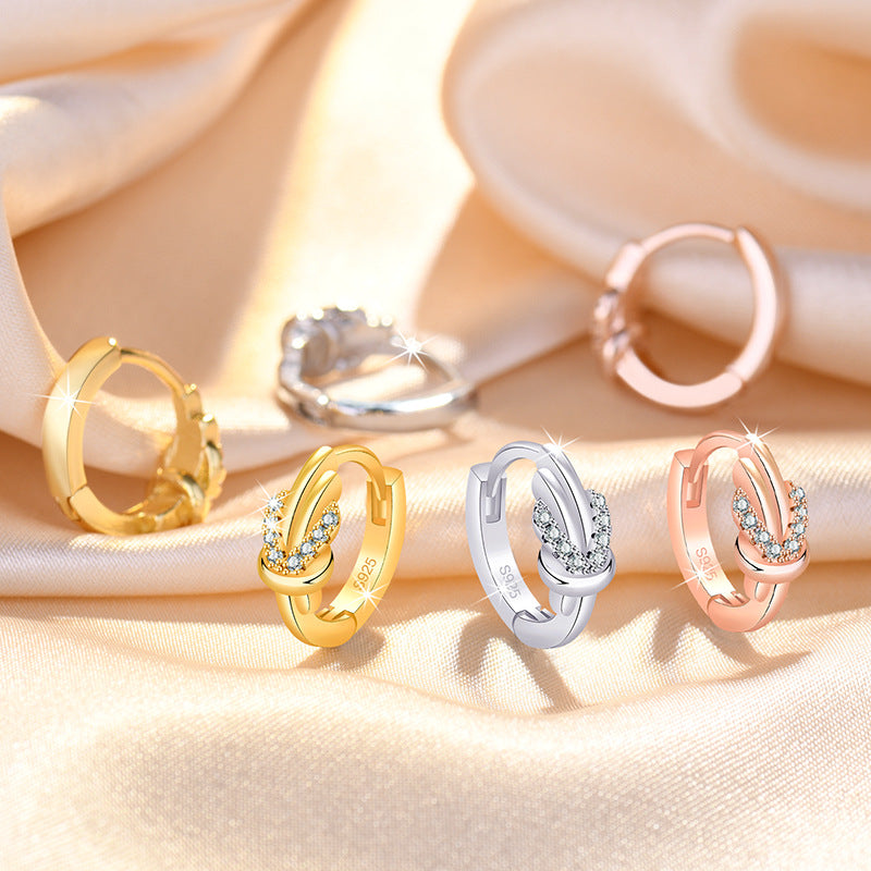 Damen Ohrringe mit elegantem Knoten-Design und funkelndem Zirkonia-Besatz Shop Nory