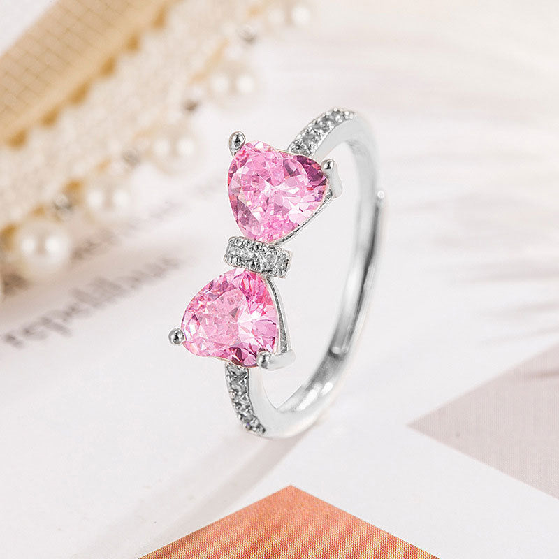 Damename-Ring mit herzförmigen Zirkonia-Steinen und funkelnden Akzenten Shop Nory