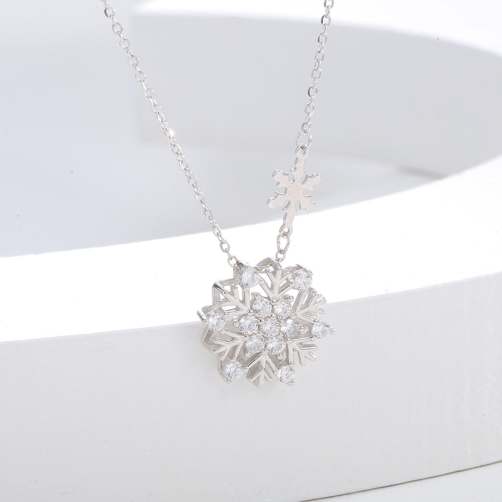 Damen elegante Halskette mit filigranem Schneeflocken-Anhänger und funkelnden Zirkonia Shop Nory