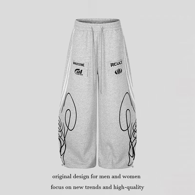 Damen Weite Midilounge‑Sweathose im Palazzo‑Cut mit Tunnelzug, Zip‑Saum und Statement‑Print Shop Nory