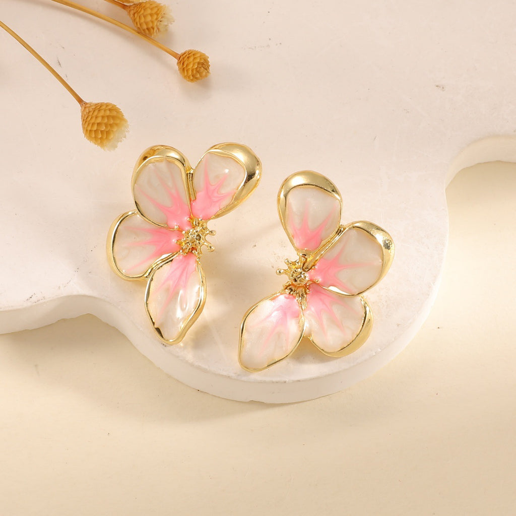 Damen Ohrclips im eleganten floralen Design mit glänzender Beschichtung Shop Nory