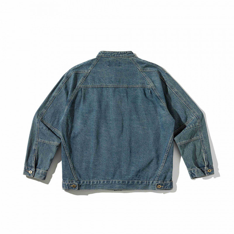 Unisex Boxige Denim‑Hemdjacke im Worker‑Look mit Stehkragen, Raglanärmeln und Brust‑Welttasche Shop Nory