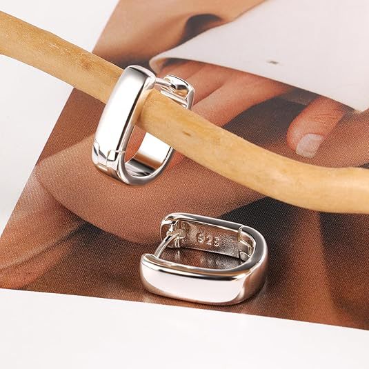 Damen Ohrringe mit modernem, geschwungenem Design Shop Nory