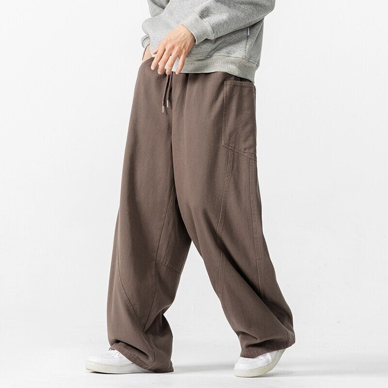 Herren Weite Loungehose mit Tunnelzug, aufgesetzten Taschen und markanten Panelnähten Shop Nory