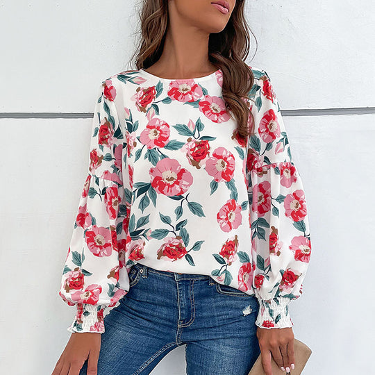Damen Leichte Bluse mit großflächigem Blumenprint, Volumenärmeln und Smokbündchen Shop Nory
