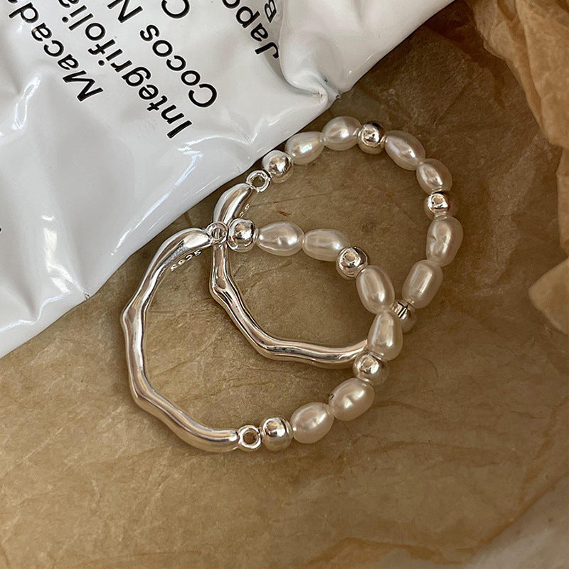 Damen eleganter Ring mit Perlen und geschwungenem Design Shop Nory