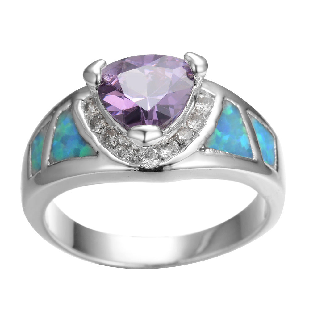 Damen Ring mit facettiertem Amethyst und opalisierenden Elementen Shop Nory