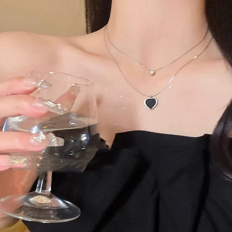 Damen mehrlagige Halskette mit herzförmigem Anhänger und funkelnden Details Shop Nory