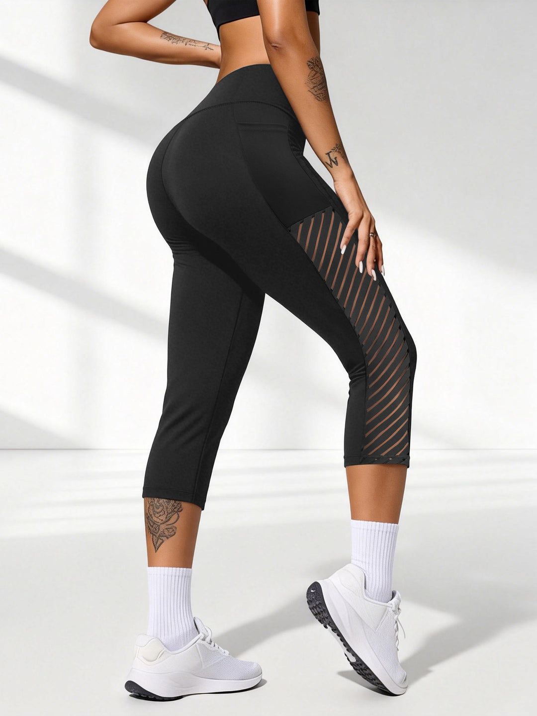 Damen Formende dreiviertel-Sportleggings mit hohem Bund, seitlichem Mesh-Einsatz und Handytasche Shopy Nory