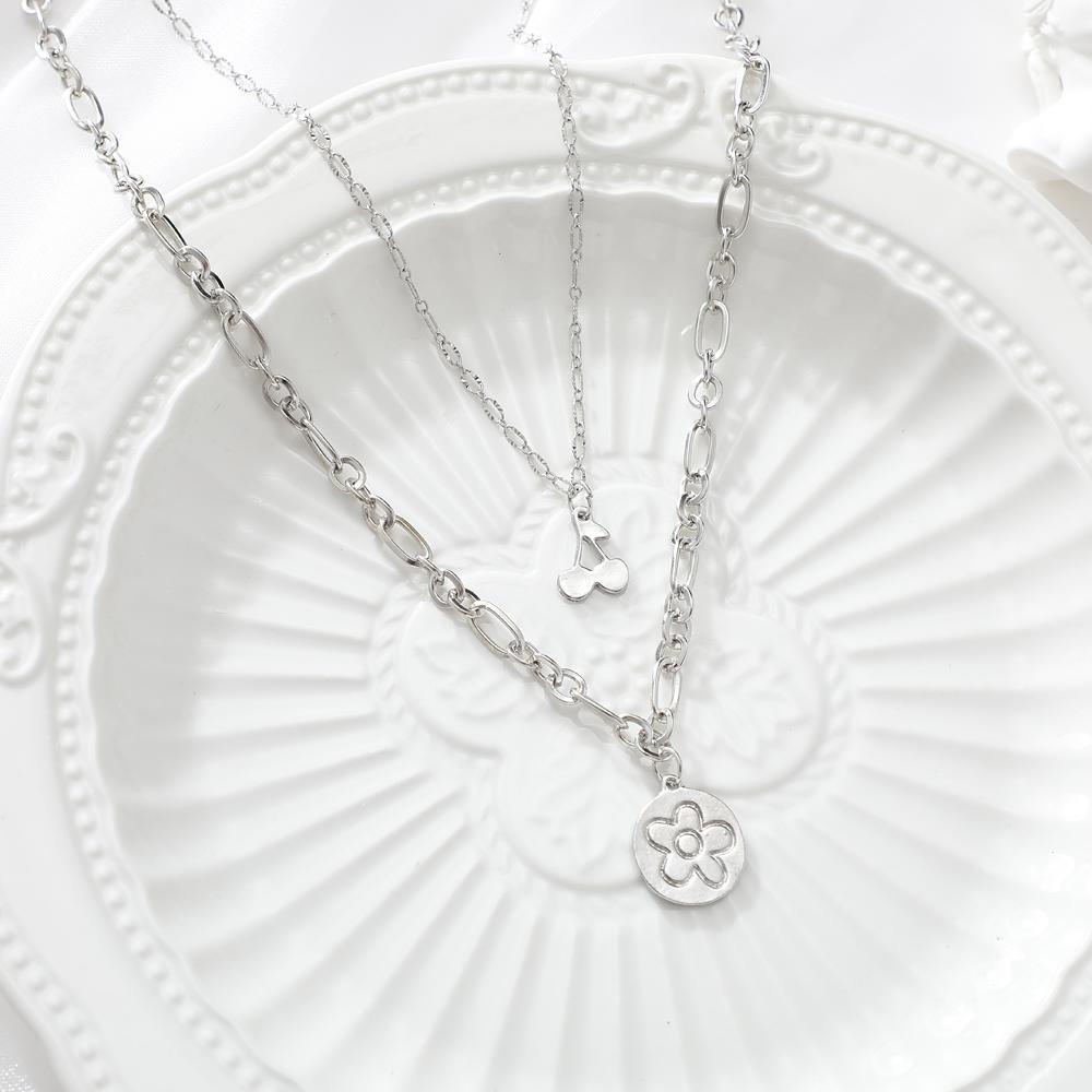 Damen mehrlagige Kette mit stilvollem Blumenanhänger Shop Nory