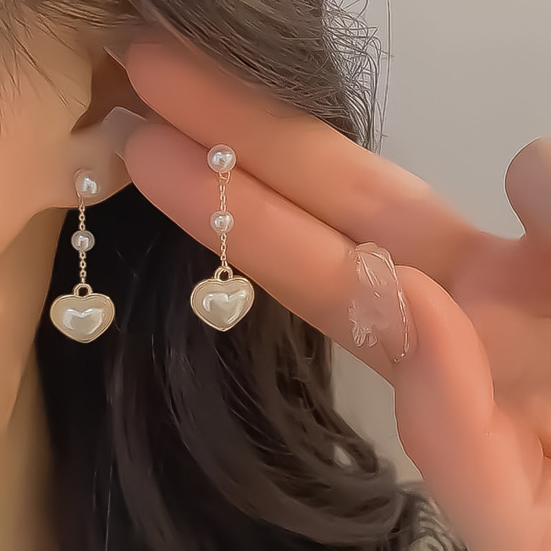 Damen Ohrhänger mit eleganten Perlen und goldenen Akzenten Shop Nory
