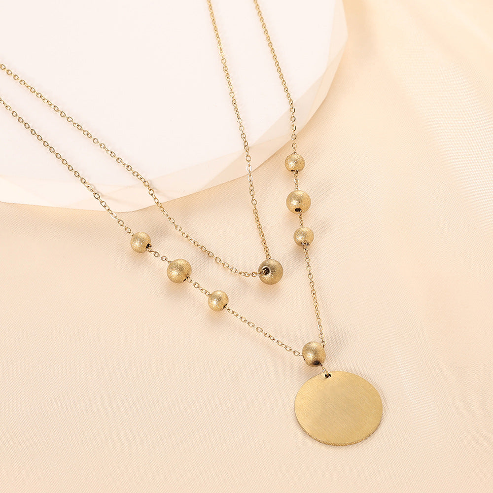 Damen Halskette mit herzförmigem Anhänger und eleganten Perlen Shop Nory