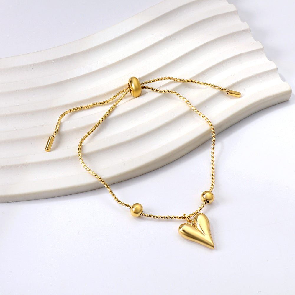 Damen Armband mit herzförmigem Anhänger und verstellbarem Verschluss Shop Nory