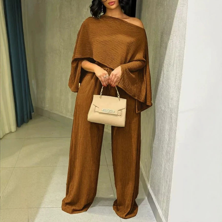 Damen Zweiteiliges Strukturiertes Loungewear‑Set mit Cropped‑Capeoberteil und Maxirock mit Seitenschlitz Shop Nory