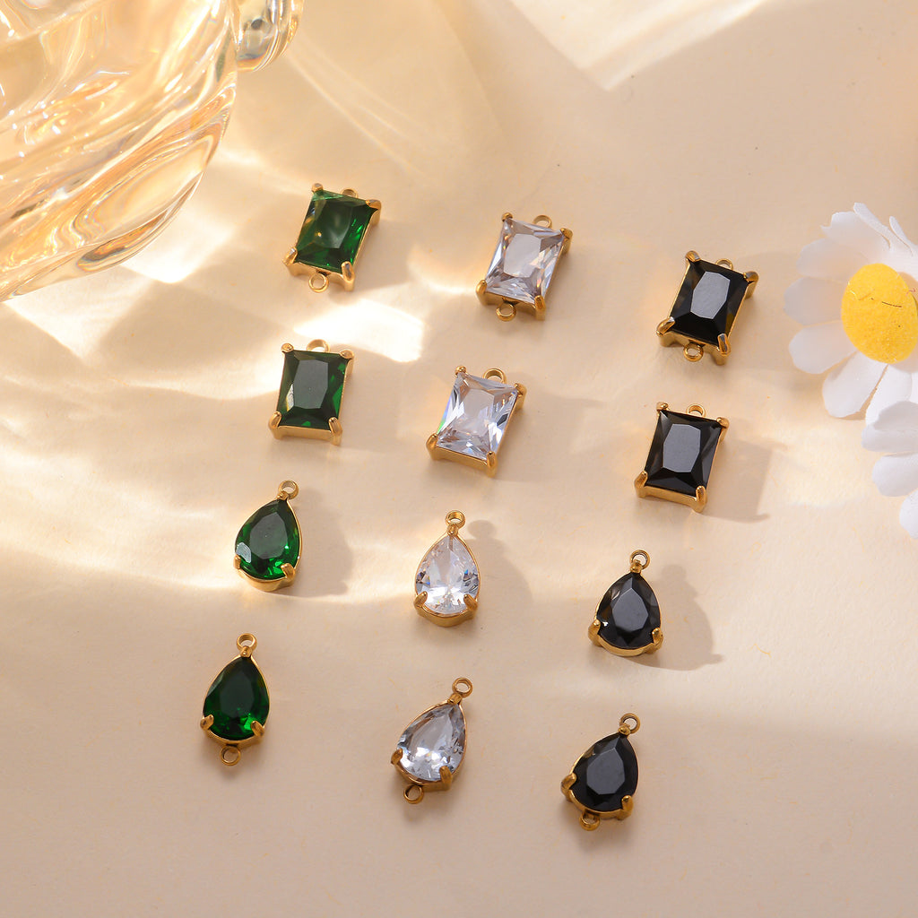 Damen Schmuckanhänger mit tropfenförmigem Kristall und elegantem Goldrahmen Shop Nory