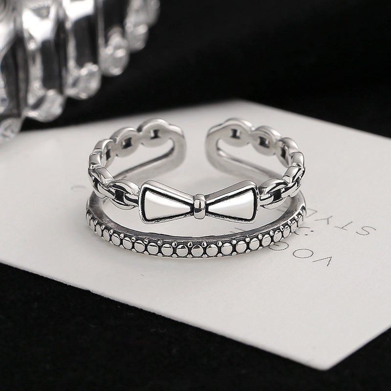 Damen modischer Ring mit verspieltem Schleifen-Design und eleganten Details Shop Nory