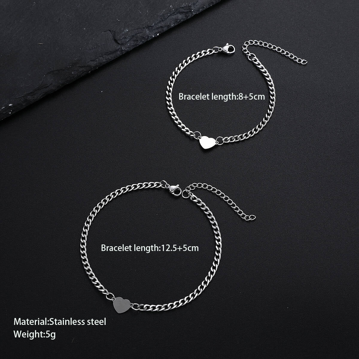 Damenarmband mit herzförmigen Anhängern und eleganter Gliederkette Shop Nory