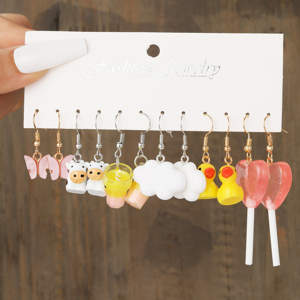 Damen hochwertige Ohrhänger mit verspielten Motivanhängern Shop Nory