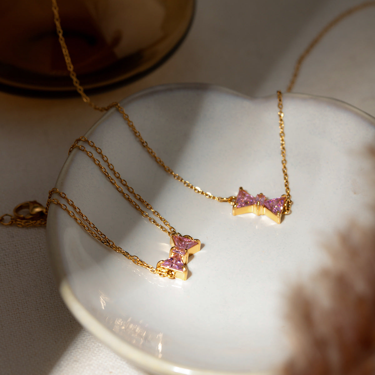 Damen Halskette mit elegantem Schleifenanhänger aus hochwertigem Edelstahl Shop Nory