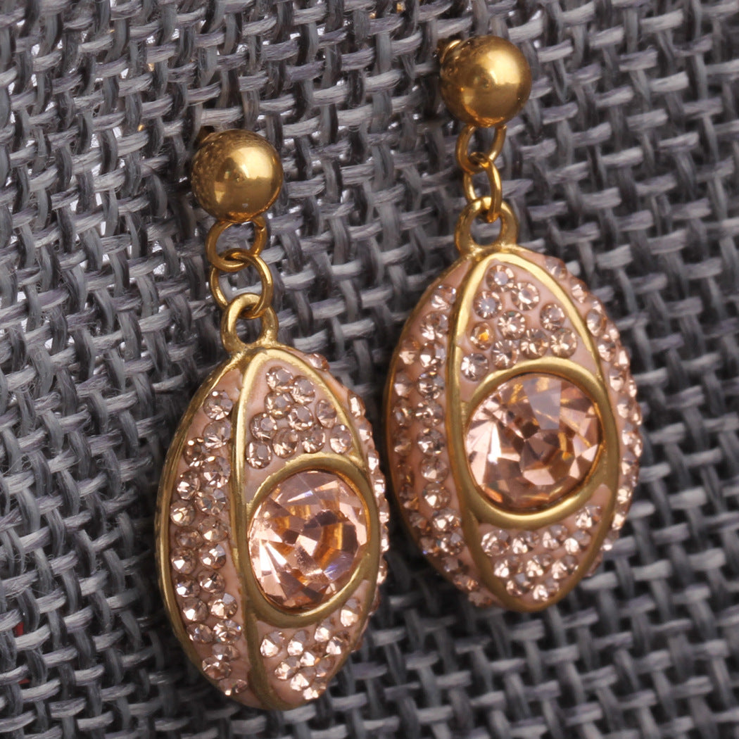 Damen Ohrhänger mit funkelndem Kristallbesatz und eleganter Roségold-Fassung Shop Nory