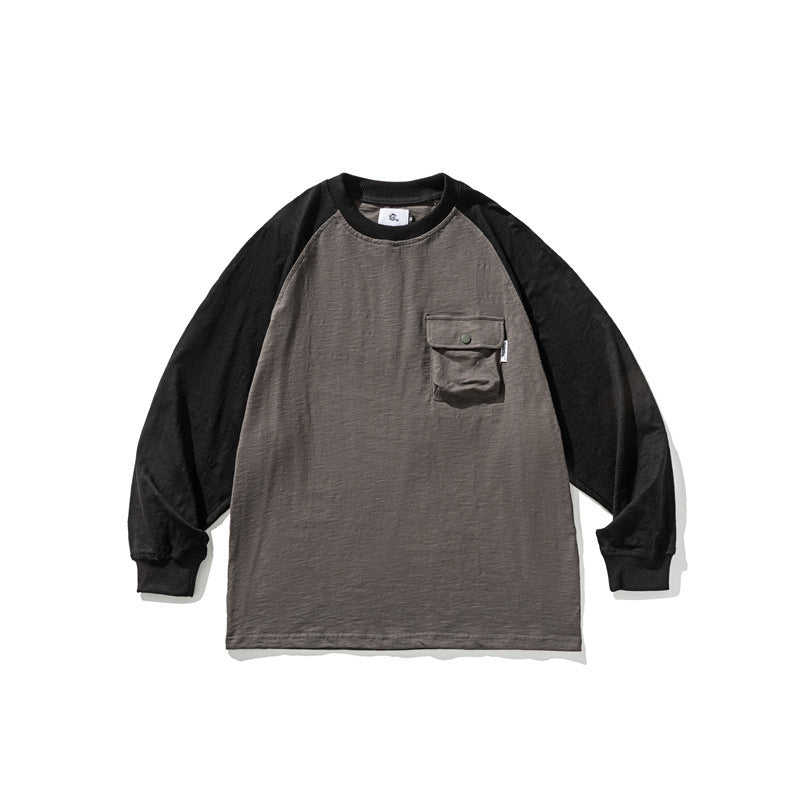 Unisex Lässiges Raglan-Longsleeve mit Kontrastärmeln und aufgesetzter Klappentasche Shop Nory