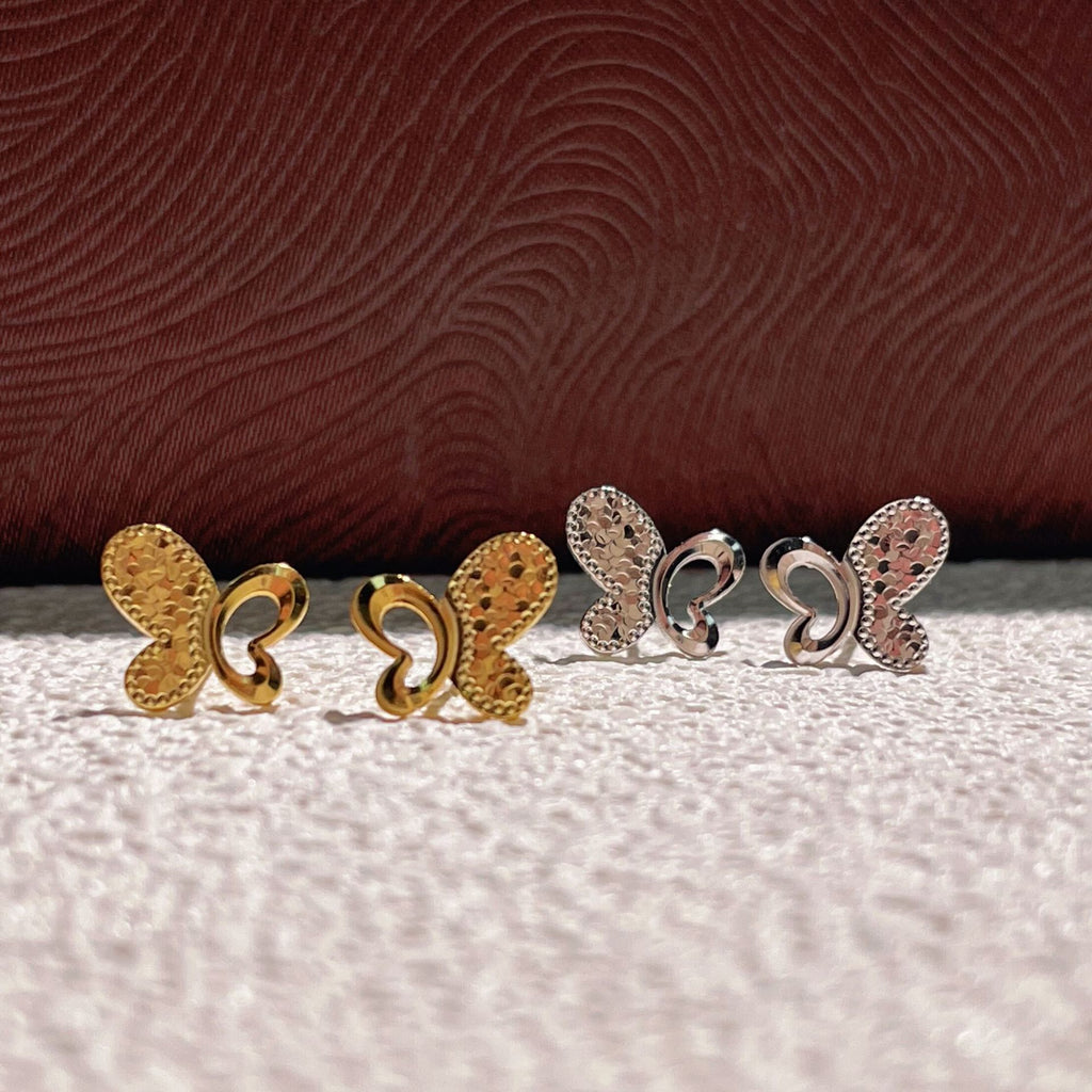 Damen Ohrstecker mit verspieltem Schmetterlingsdesign und funkelnden Akzenten Shop Nory