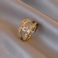 Damen Offener Ring mit kunstvollem Zirkonia-Besatz und glänzendem Goldfinish Shop Nory