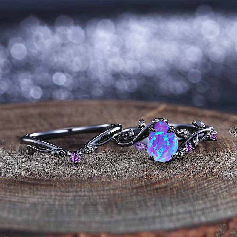 Damen Ring mit kunstvollem floralen Design und leuchtendem Opal Shop Nory