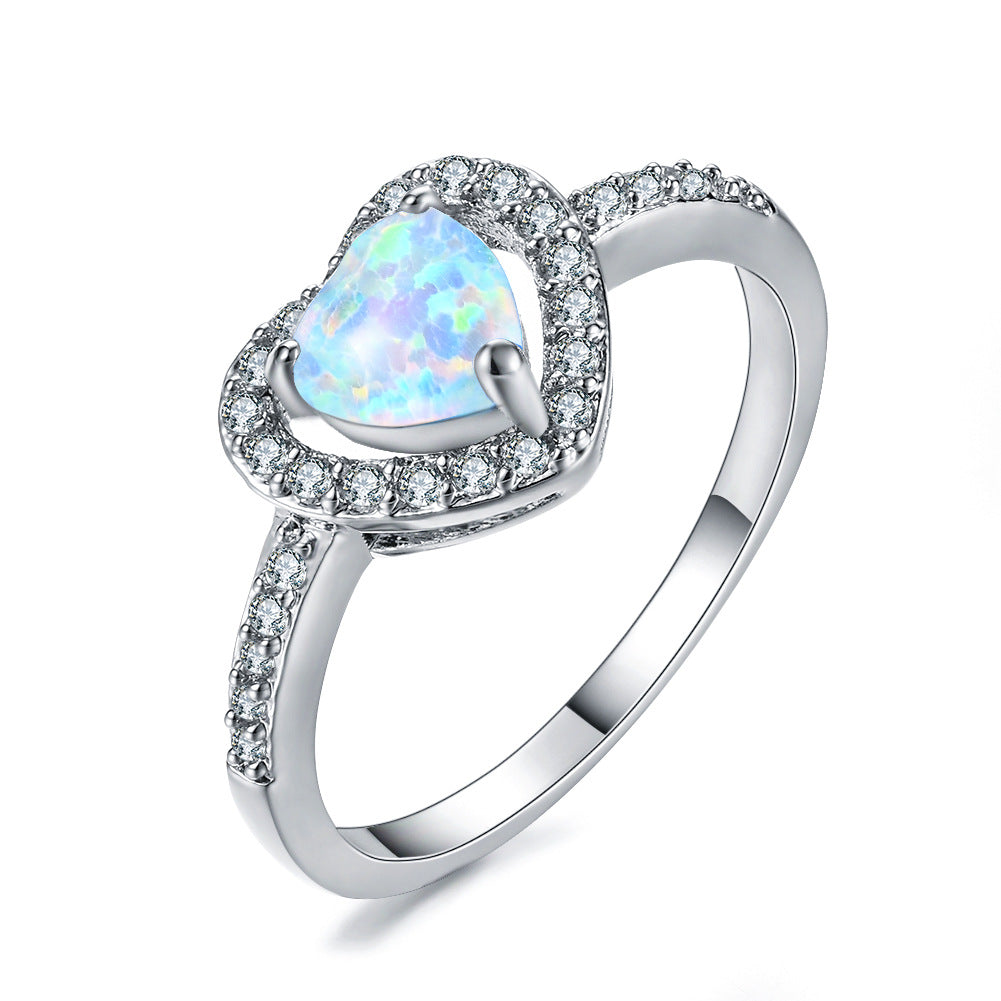 Damen Ring mit herzförmigem Opal und funkelnden Zirkonia-Verzierungen Shop Nory