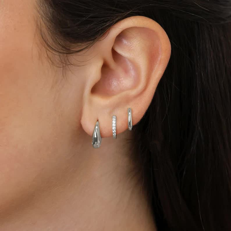 Damen Ohrstecker-Set mit eleganten Spiralen und funkelnden Akzenten Shop Nory