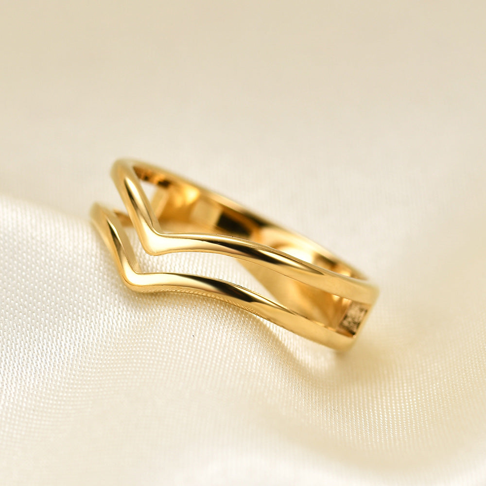 Damen Ring mit modernem, geschwungenem Design und funkelnden Akzenten Shop Nory