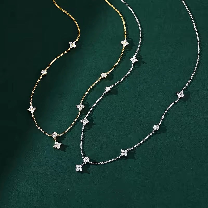 Damen Halskette mit zierlichen Blütenmotiven und funkelnden Zirkonia Shop Nory