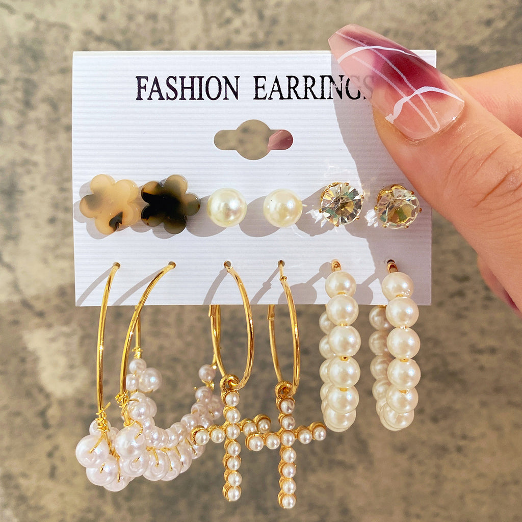 Damen Ohrringe Set mit eleganten herzförmigen Anhängern und funkelnden Kristallen Shop Nory