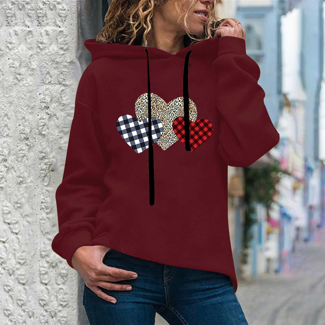 Damen nan lässiger Oversize Kapuzenpullover mit Herz‑und‑Pfotenprint, Kordelzug und gerippten Bündchen Shop Nory